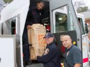 Emergency workers with gifts