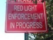 Warning signs used in connection with the  Red-Light program