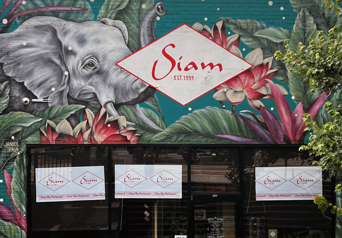 Exterior mural at Siam Thai Restaurant at 123 Sycamore Street in downtown Decatur, Georgia